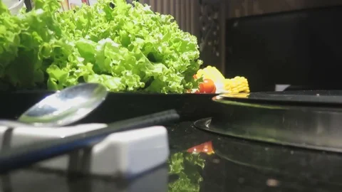 Using the grill in the restaurant Stock Footage 70540562