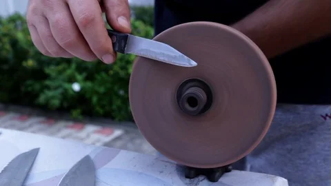 Using a Hand cranked Grinder Stock-Footage 116983455