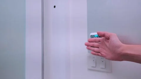 Using hand motion sensor technology to open door Stock Footage 248531206