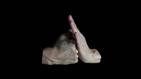 Using hand palm to stop punch fist from attack isolated on black background. Stock Photos