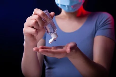 Using Hand Sanitizer Foto stock
