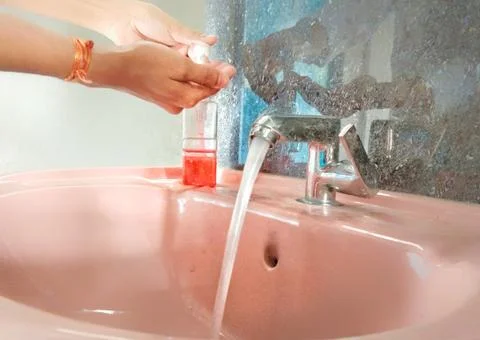 Using hand wash-01-01 Stock Photos