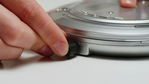 Using headphone for old music portable compact player close-up. Listen to music Stock-Footage 277417576