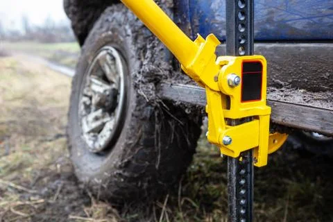 Using a high-lift jack closeup. Stock Photos