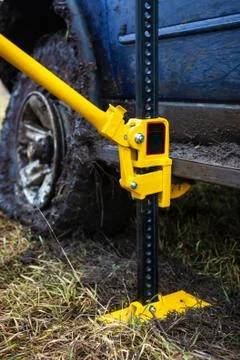 Using a high-lift jack closeup. Foto stock