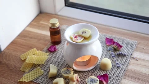 Using homemade mini wax melts in aromatherapy lamp diffuser. Stock Footage 147337501