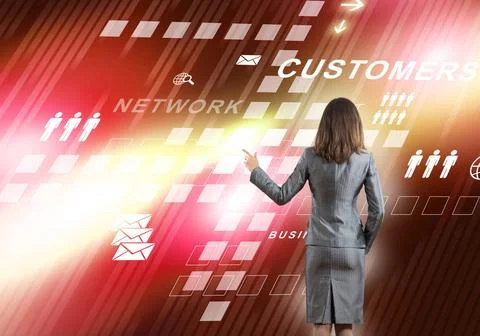 Using innovative technologies Back view of businesswoman working with digi... Stock-Fotos