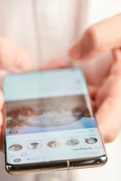 Using instagram mobile app Stock Photos