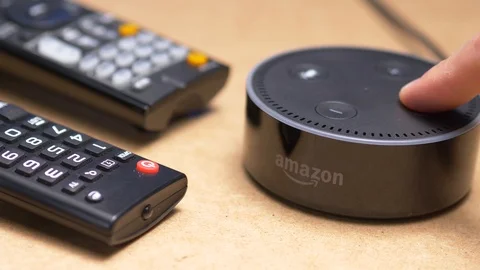 Using a Intelligent Smart Assistant In Living Room Amazon Echo Stock Footage 93564221