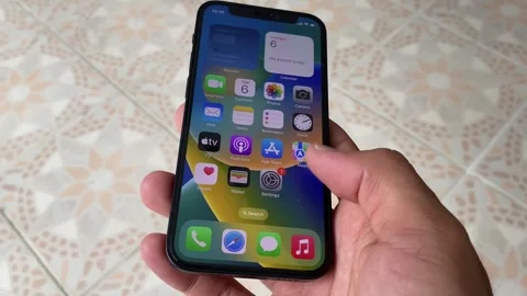 Using iphone 12 mini swiping up gesture on "Welcome to iPhone" menu Video stock 243092809