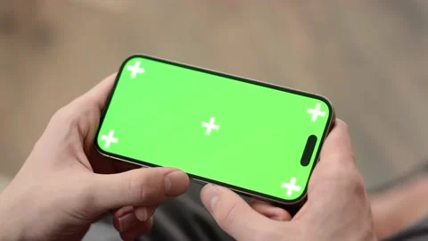 Using iPhone 14 with chroma key green screen, advertising apps, social media Stock-Footage 231315300