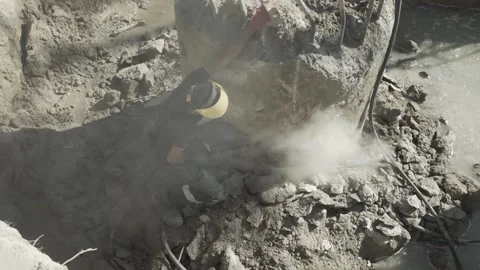 Using a jackhammer to beat off a reinforced concrete structure Stock Footage 280969594