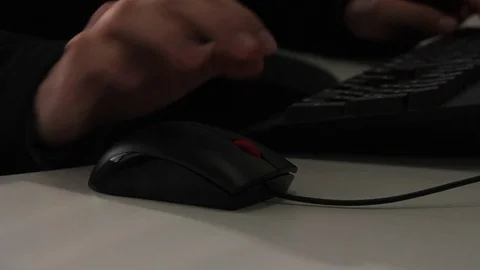 Using keyboard and mouse Stock Footage 77051975