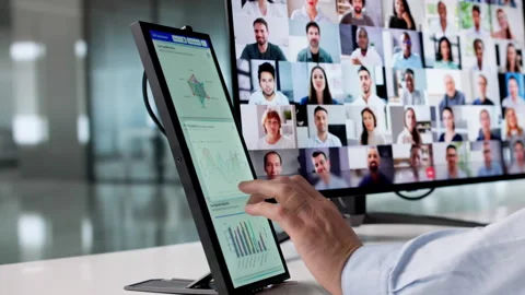 Using KPI Dashboard On Secondary Screen Stock Footage 328391775