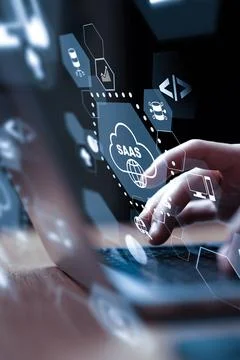 Using a laptop to access SaaS technology and tools for business solutions Stock Photos
