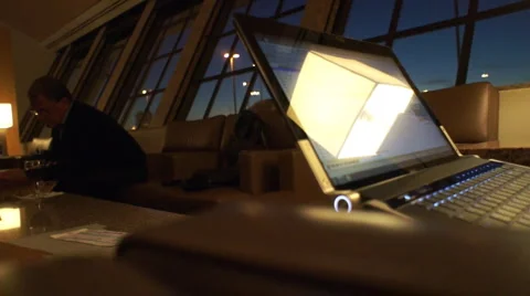 Using Laptop in Airport Lounge Stock Footage 1049068