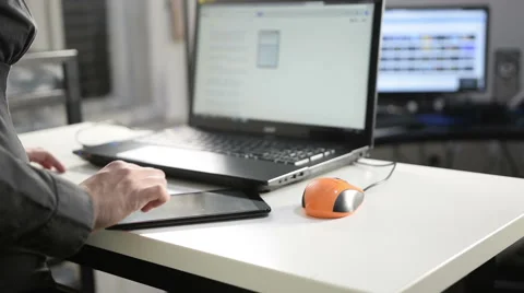 Using Laptop and Tablet Stock Footage 49287160