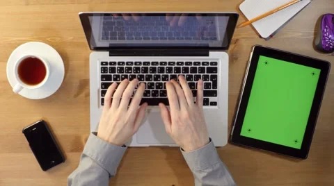 Using Laptop and Tablet PC with a Green Screen at the Desktop. Stock Footage 60406486