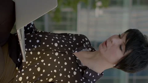 Using laptop with artificial intelligence, businesswoman engages in remote work. Stock Footage 276919237