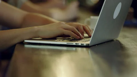 Using laptop in a cafe Stock Footage 68157172