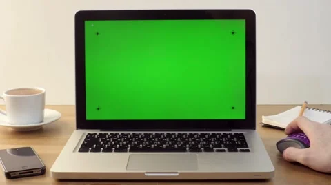 Using Laptop with a Green Screen at the Workplace Stock Footage 60688554
