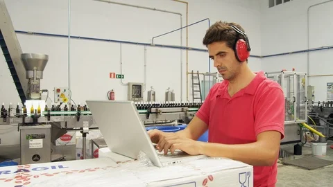 Using Laptop, Indoors, Day, Standing, Side View, Working, Industry, Medium Shot, Stock Footage 94030098