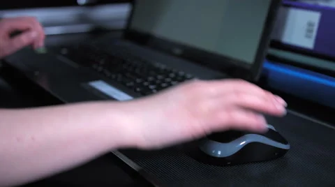 Using laptop &amp; mouse Stock Footage 50089252
