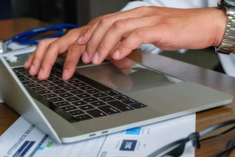 Using laptop for online working. Stock Photos