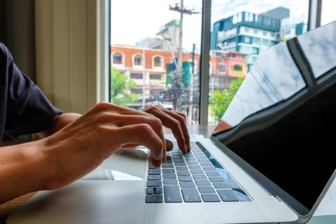 Using laptop for online working. Stock Photos