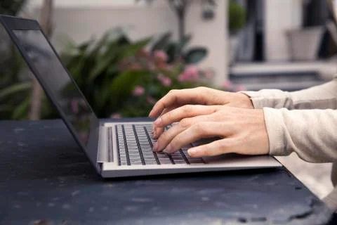 Using laptop outdoors Stock Photos