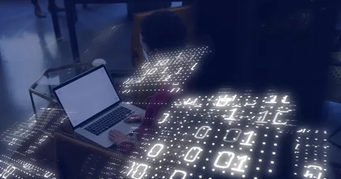 Using laptop, person viewing binary code animation overlay in school setting Video stock 306202674