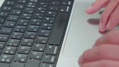 Using Laptop Trackpad and Typing Close Up Video stock 338368491