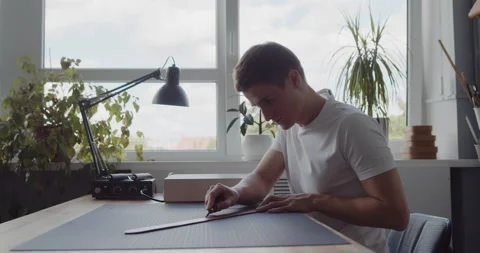 Using leather edge beveler during belt manufacturing process Stock Footage 146135434