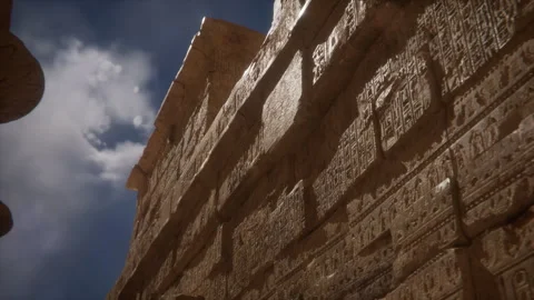 Using light to highlight the beauty of the walls and inscriptions in the tem Stock Footage 290846469