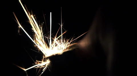 Using a Lighter at Night with Sparkles. Full HD Stock Footage 46156843
