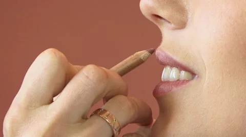 Using Lip Pen Video stock 52487812