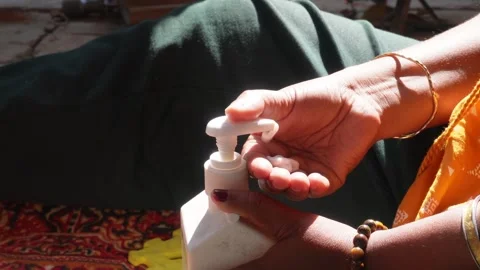 Using Liquid Soap Hand Sanitizer Stock Footage 332573330