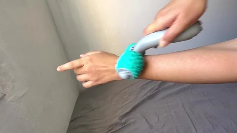 Using manual spiky massager tool for forearm and muscle recovery Stock Footage 345831762