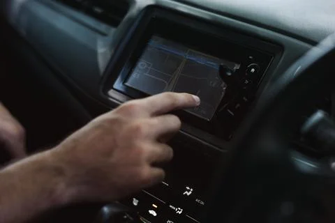 Using a map in a car for a direction Stock Photos