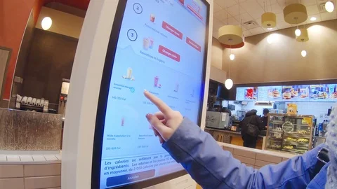 Using a McDonald's Touchscreen Kiosk To Order Food Stock Footage