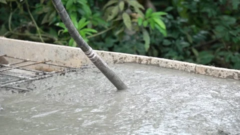 Using Mechanical Concrete Vibrator Machine on Poured Wet Cement Close Up. Stock Footage 337850883