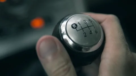 Using mechanical manual gear box gearstick, driving a car Stock-Footage 157327583