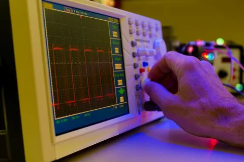 Using the microscope electronics laboratory Stock Photos