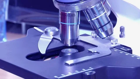 Using a Microscope in Science Stock Footage 71262050