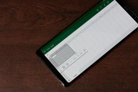 Using microsoft excel mobile Stock Photos