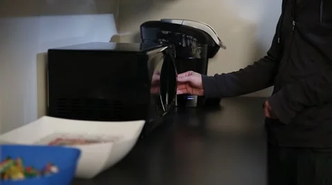 Using a Microwave Stock Footage 45867446