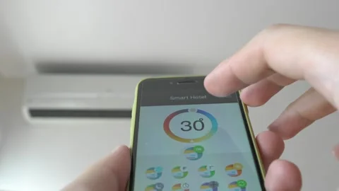 Using Mobile App for Home Climate Control Video stock 314455530