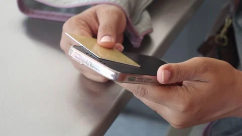 Using mobile payment technology at a retail location Video stock 302816547