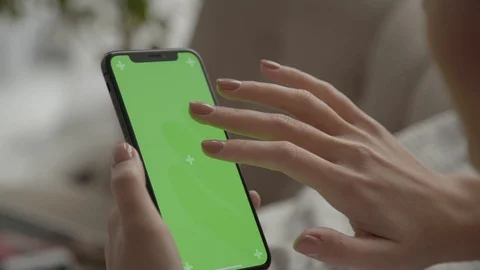 Using mobile phone, browsing Internet, watching content, videos. POV Stock-Footage 122909504