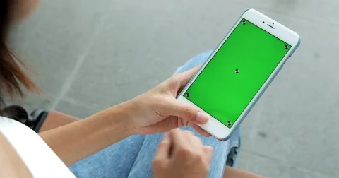 Using mobile phone with green chroma key Video stock 79616971